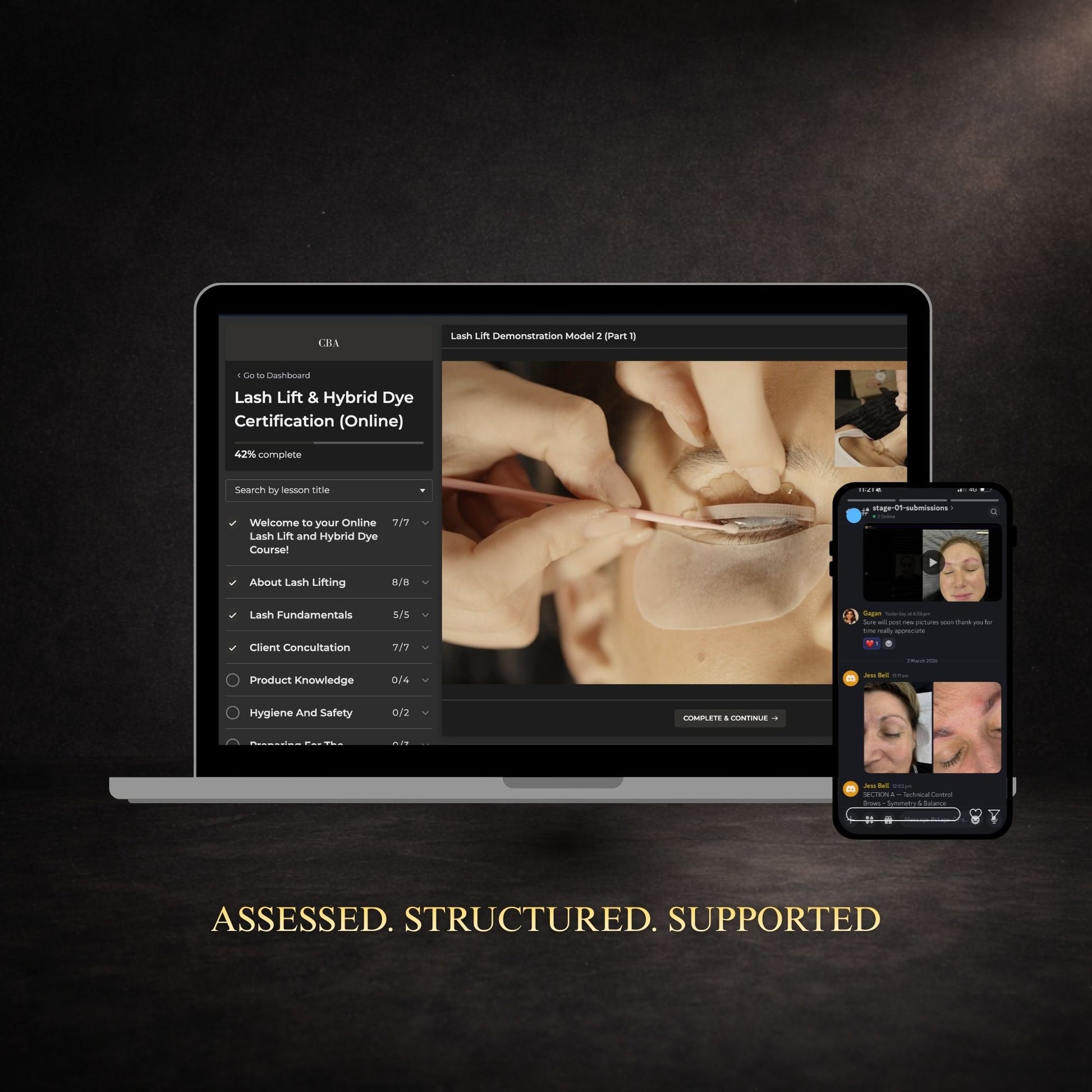 Laptop and phone displaying lash certification course on a dark background