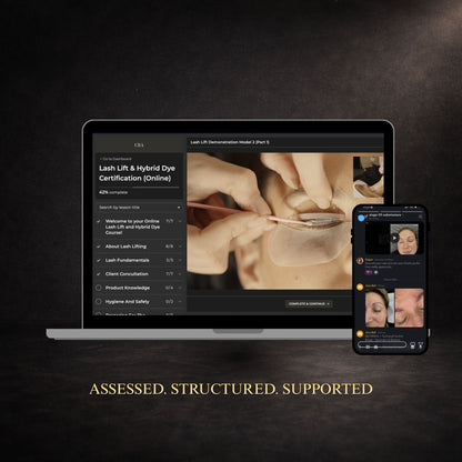 Laptop and phone displaying lash certification course on a dark background